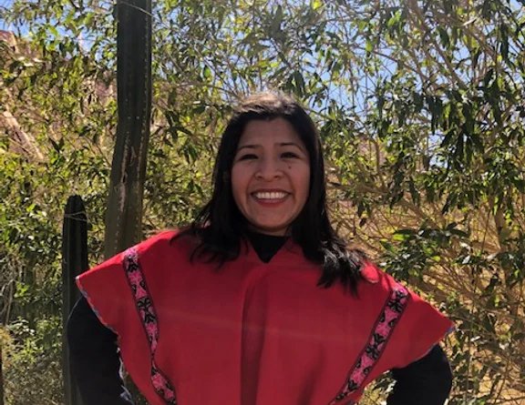 Mariaelena Huambachano with red poncho