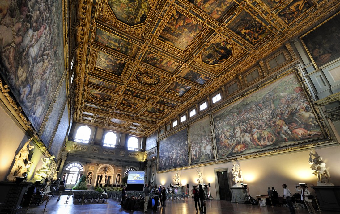 Building interior adorned with Renaissance art.