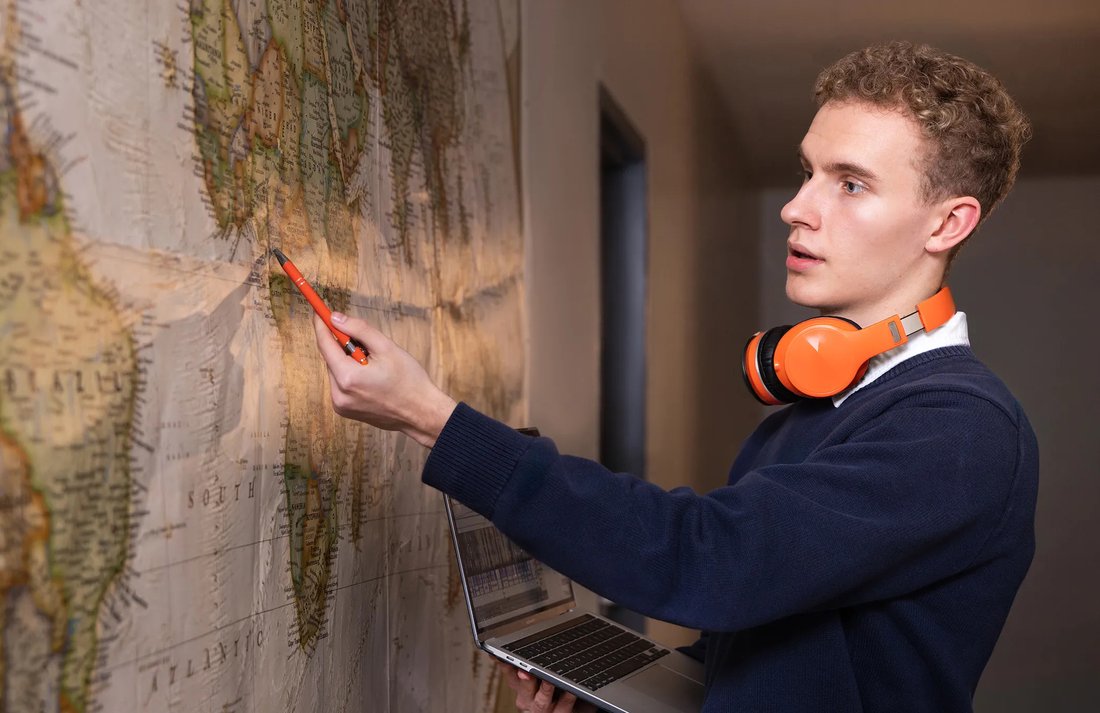Person pointing to a map.