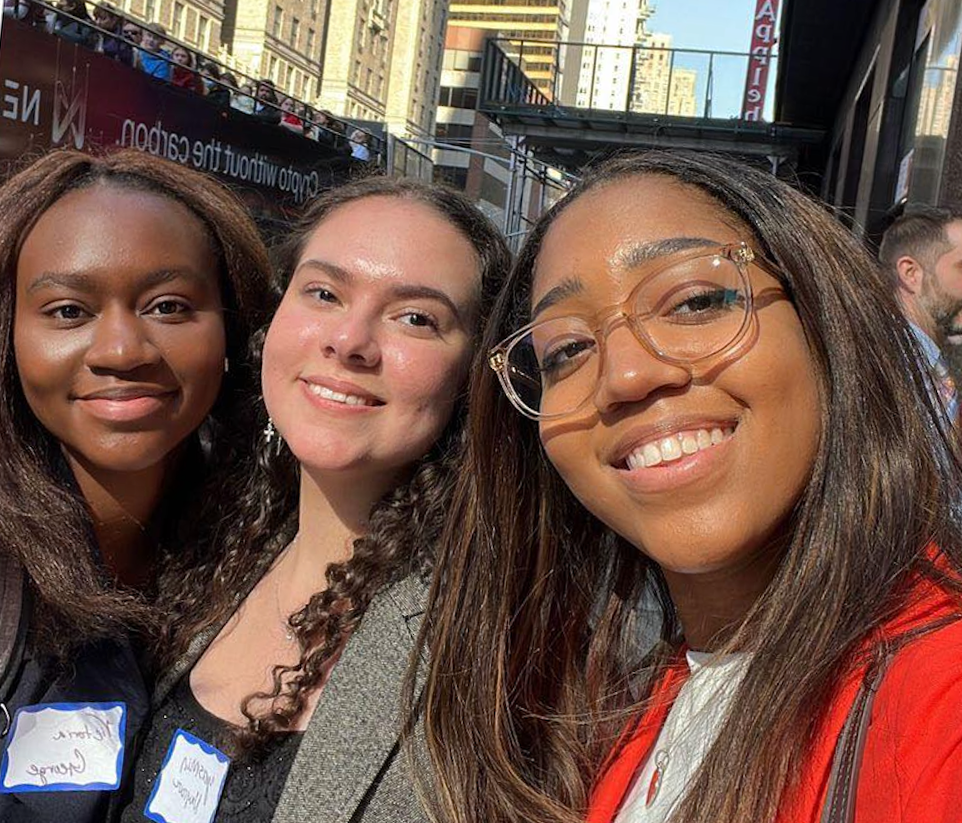 Sianna Harvey posts a quick selfie with other participants before heading into their next stop for the day.