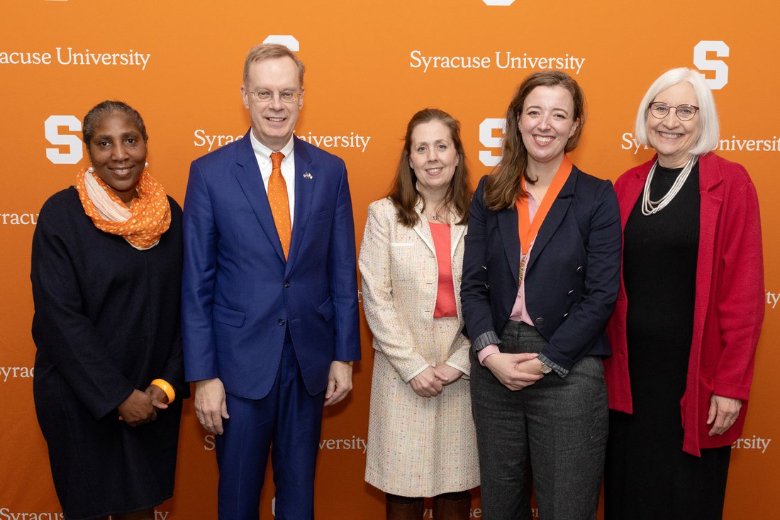 interim dean lois agnew and group present crown honors professorship to heidi henhly