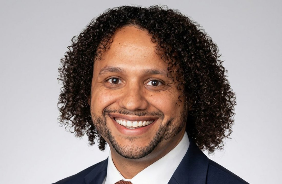 Person wearing a suit.