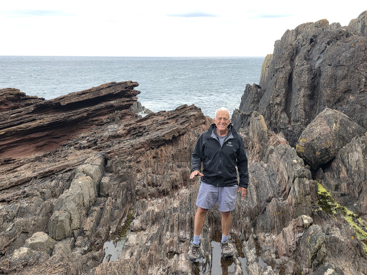 Person standing at Siccar Point.