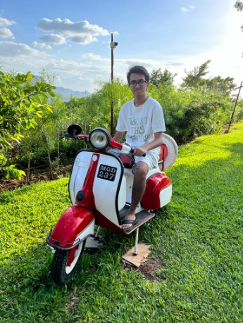 person on a motor scooter
