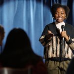 Female Comedian on stage