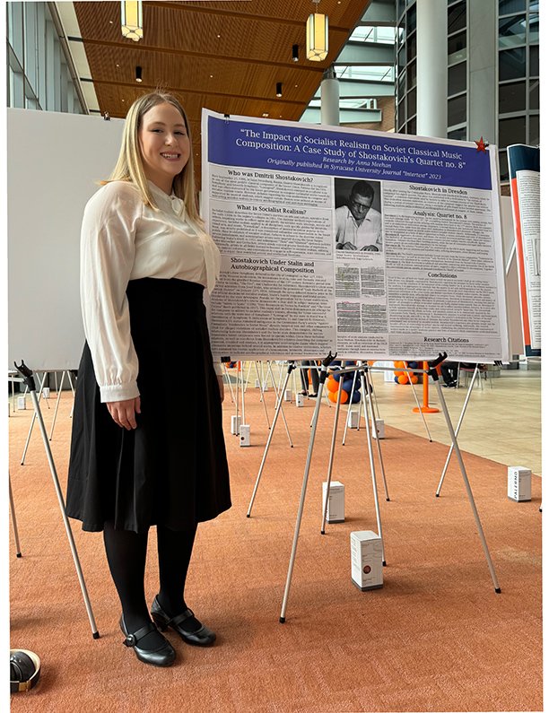 Anna presenting a poster