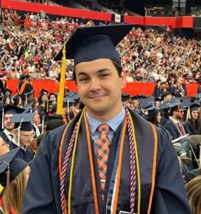 Anthony Ruscitto in a cap and gown at graduation.