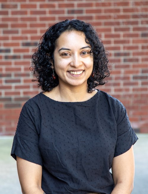 Woman in a black shirt.