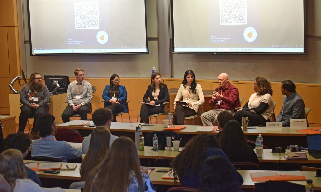 Group of people on a panel.