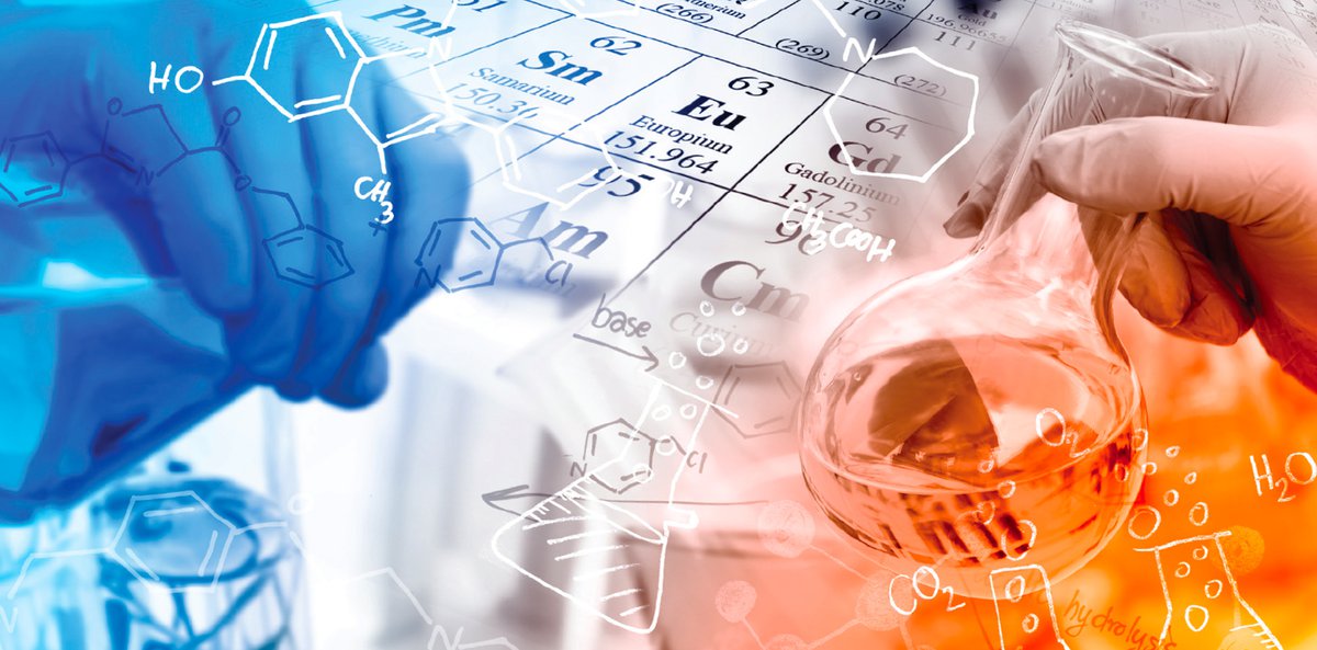 Chemistry beaker and periodic table.