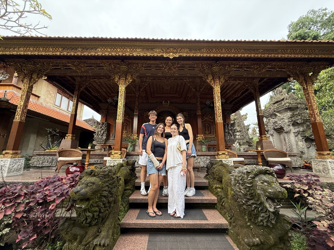 Group of people at a garden temple.