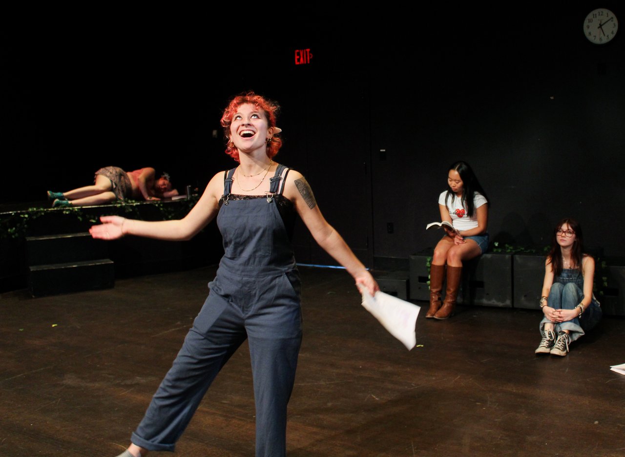 Actor performing on a stage.