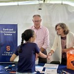 Department chair Gregory Hoke (center) and professor Linda Ivany (right) greet a new Earth and Environmental Sciences student.