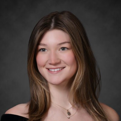 A close-up headshot of a female student