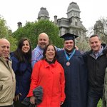 A family in front of Hall of Languages.