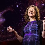Gabriela González G’95 delivering a TED Talk.