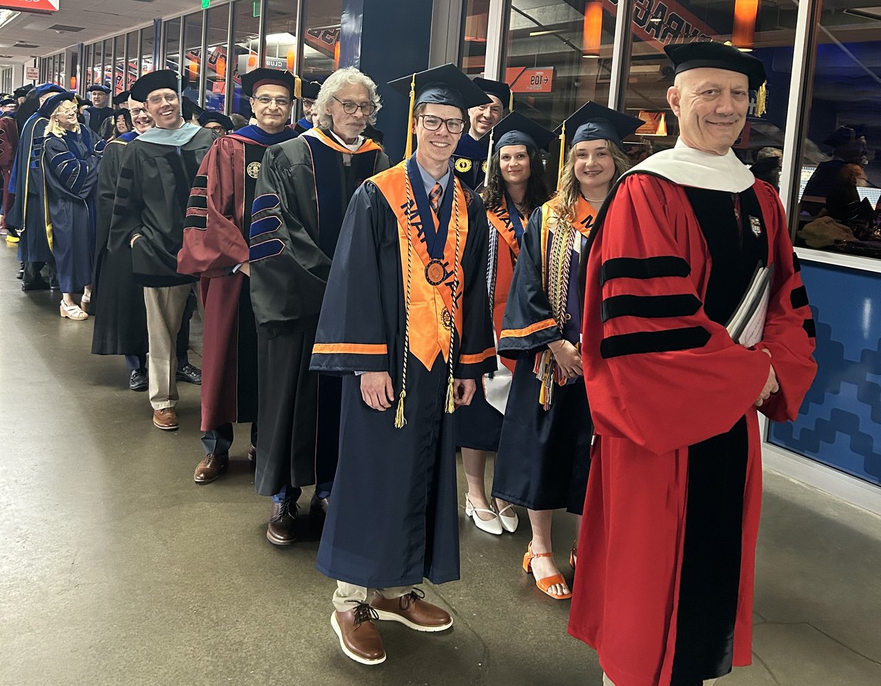 Group of people in cap and gowns