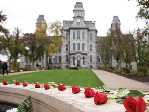 Hall of Languages with roses in the foreground.