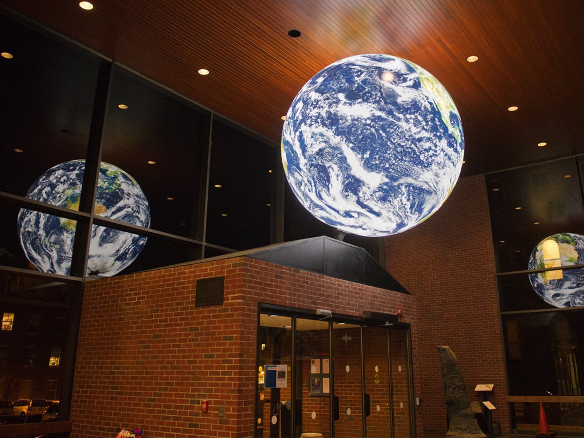 Heroy Geology Laboratory with its globe lit.