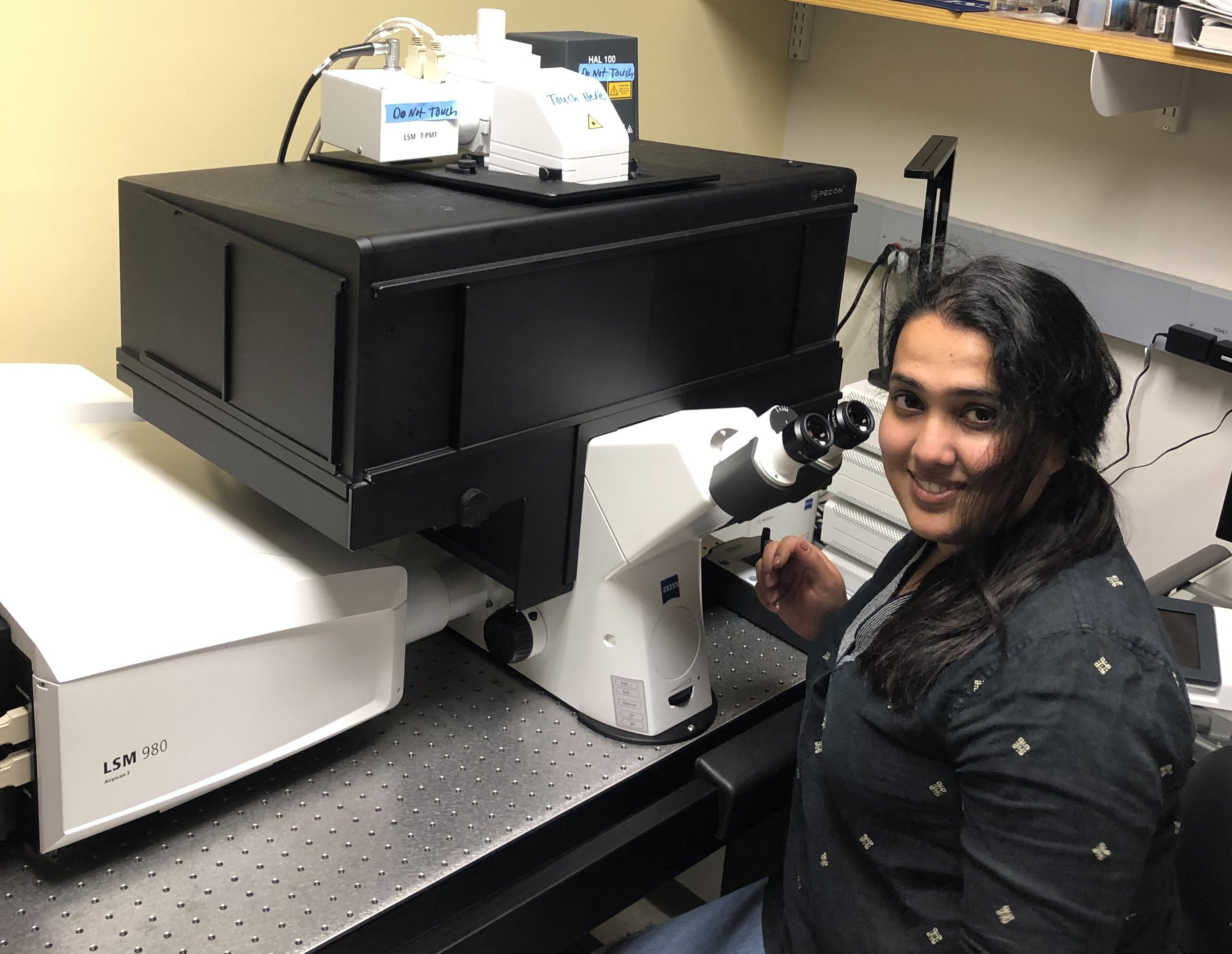 Nikhila Krishnan with Confocal Microscope