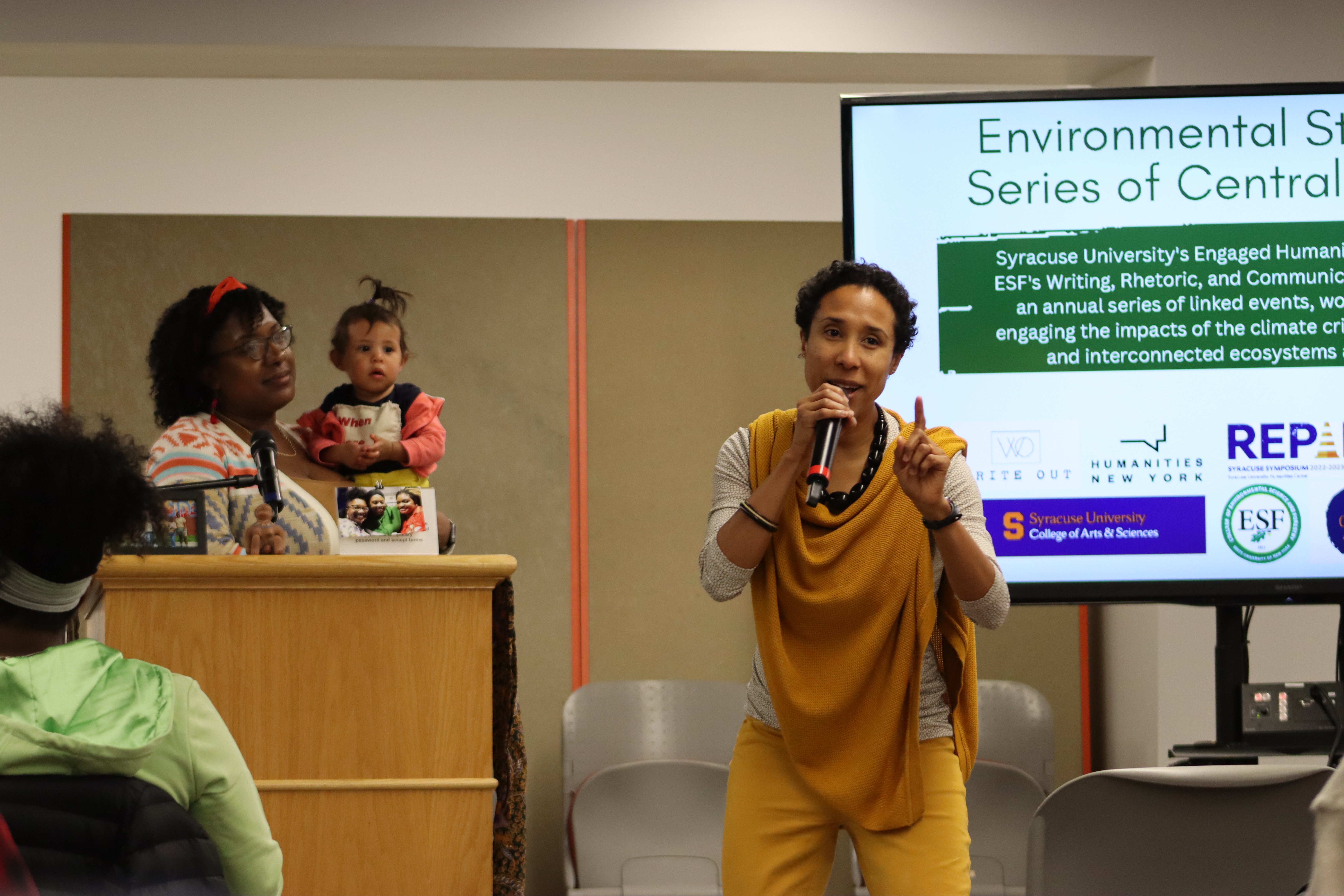 EHN Graduate Research Assistant Sarah Nahar speaks to a large Environmental Storytelling Series audience