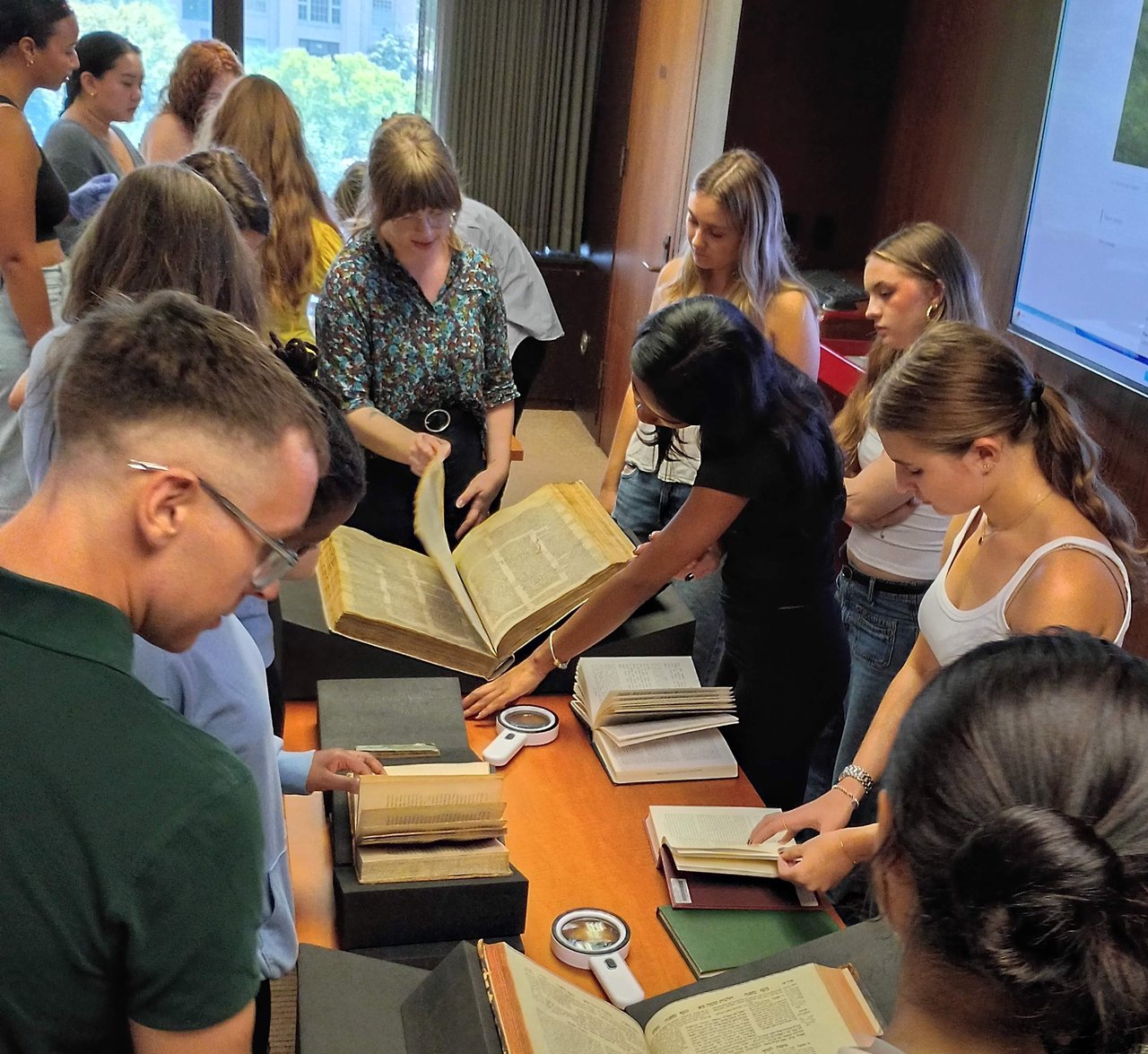 Students encountering historical manuscripts at Bird library’s Special Collections Research Center.