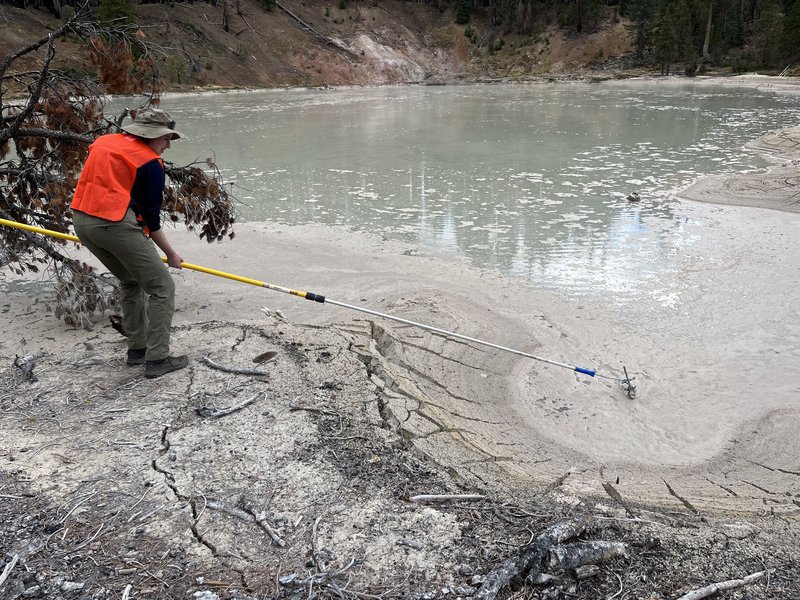 Hannah Rappaport sampling geothermal lake