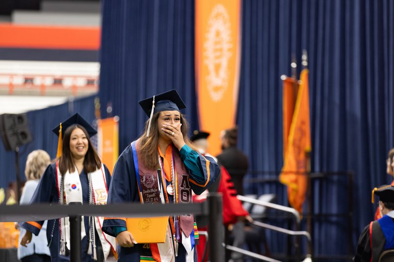 Student overcome with emotion after receiving diploma at convocation 2024