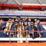 Students in graduation regalia.