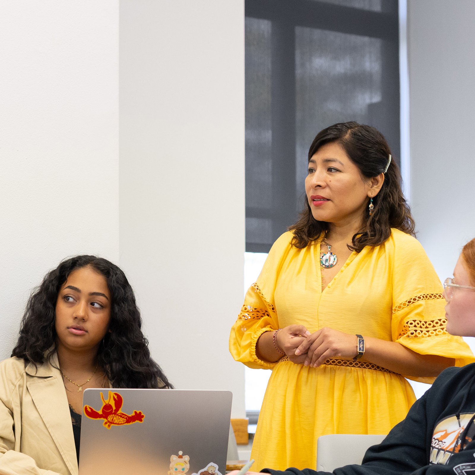 Biotechnology student and faculty in a lab.