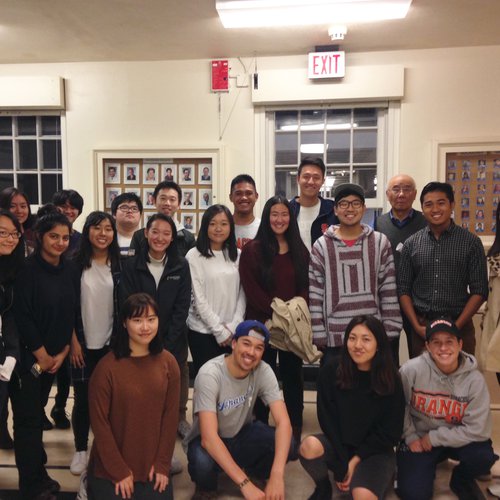 Group of  20 asian students with a faculty member