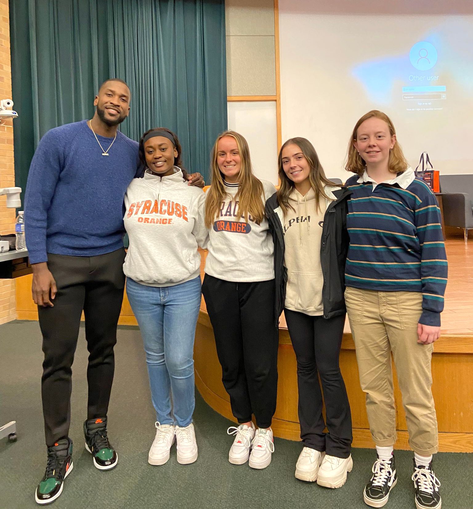 Michael Kidd-Gilchrist with Four Students.jpg