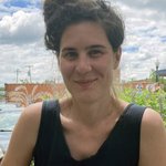 Portrait of a woman in a blue dress.