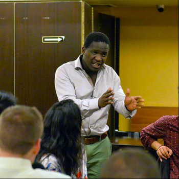 David Mwambari teaching a class of students.