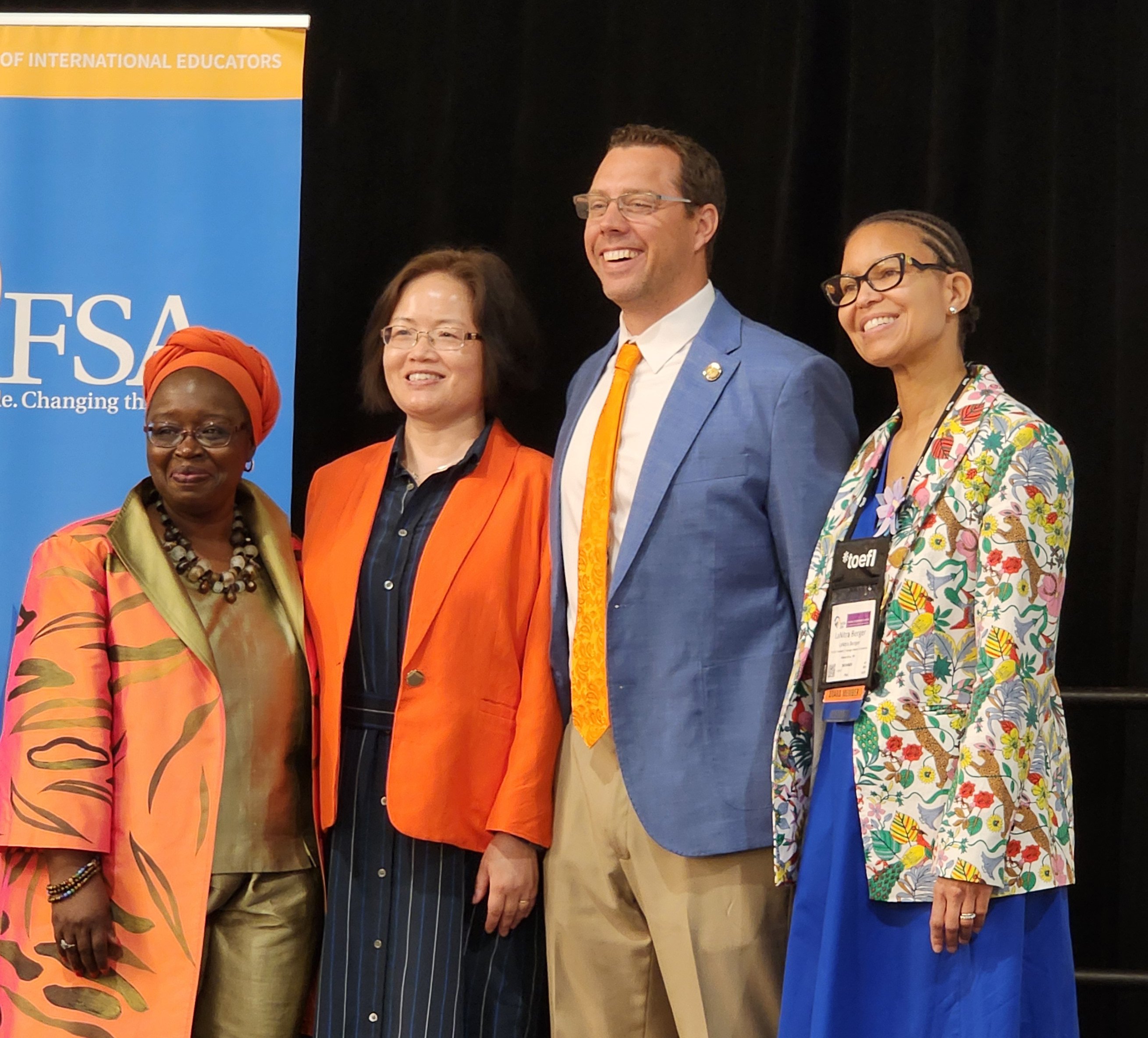 Ling LeBeau and Steve Schaffling Accepting NAFSA Award