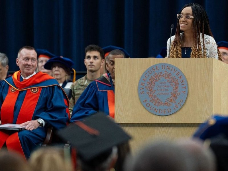 Person at a podium speaking.