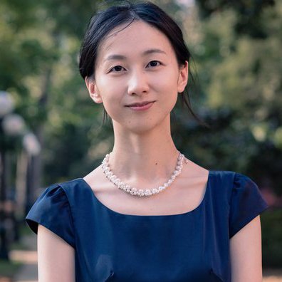 portrait of a woman with black hair and a elegant necklace