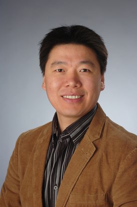 Qiu Wang