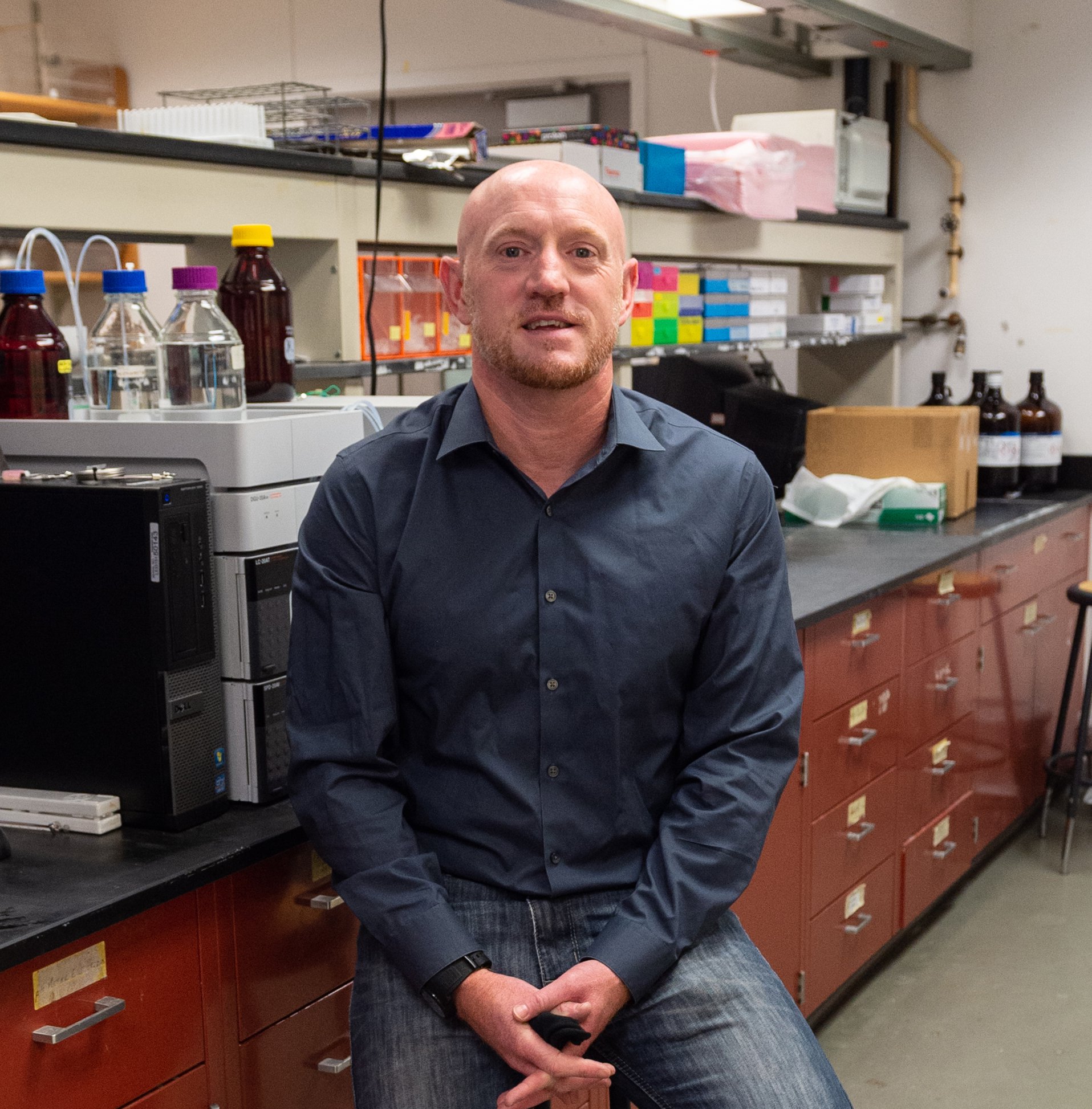 Robert Doyle sitting in a lab.