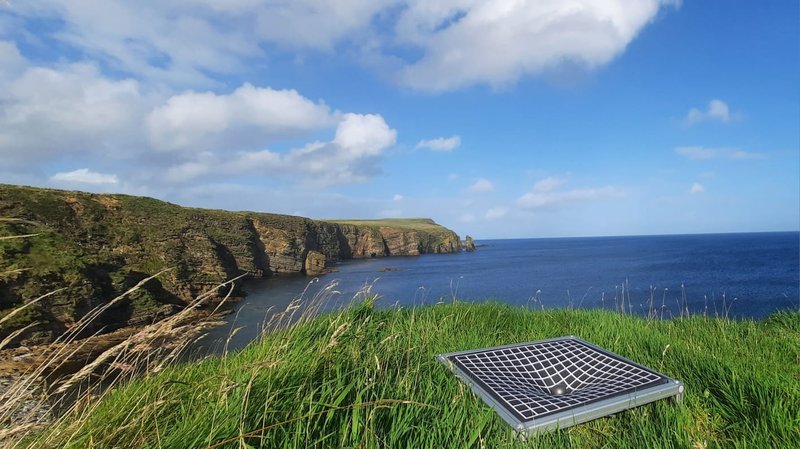 Rubber spacetime demonstrator on cliffs of Orkney