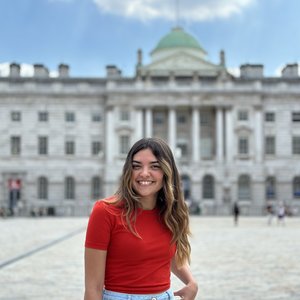 Maggie Sardino standing in front of the historic Somerset House in London.