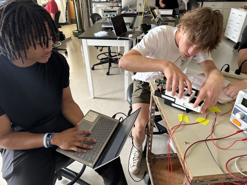 High school studens building cosmic ray detector