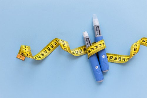 GLP injection mechanisims with a measuring tape wrapped around.