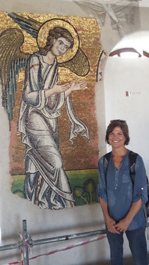 Professor Virginia Burrus visited the Church of the Nativity in Bethlehem, where restorers had recently uncovered a mosaic of a golden angel.