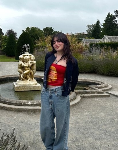 Valeria Martinez-Gutierrez standing in front of a fountain.