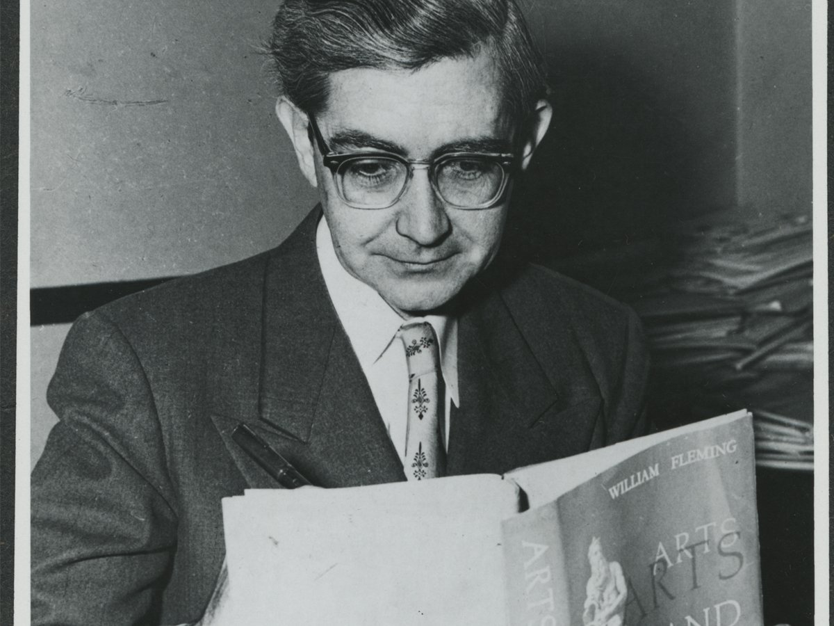 William Flemming reading a book.
