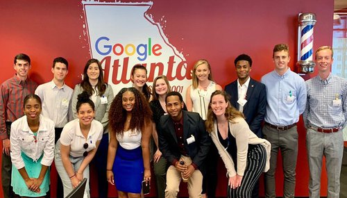 Dineen (back row, fourth from right) at Google&#x27;s sales and marketing office in Midtown Atlanta.