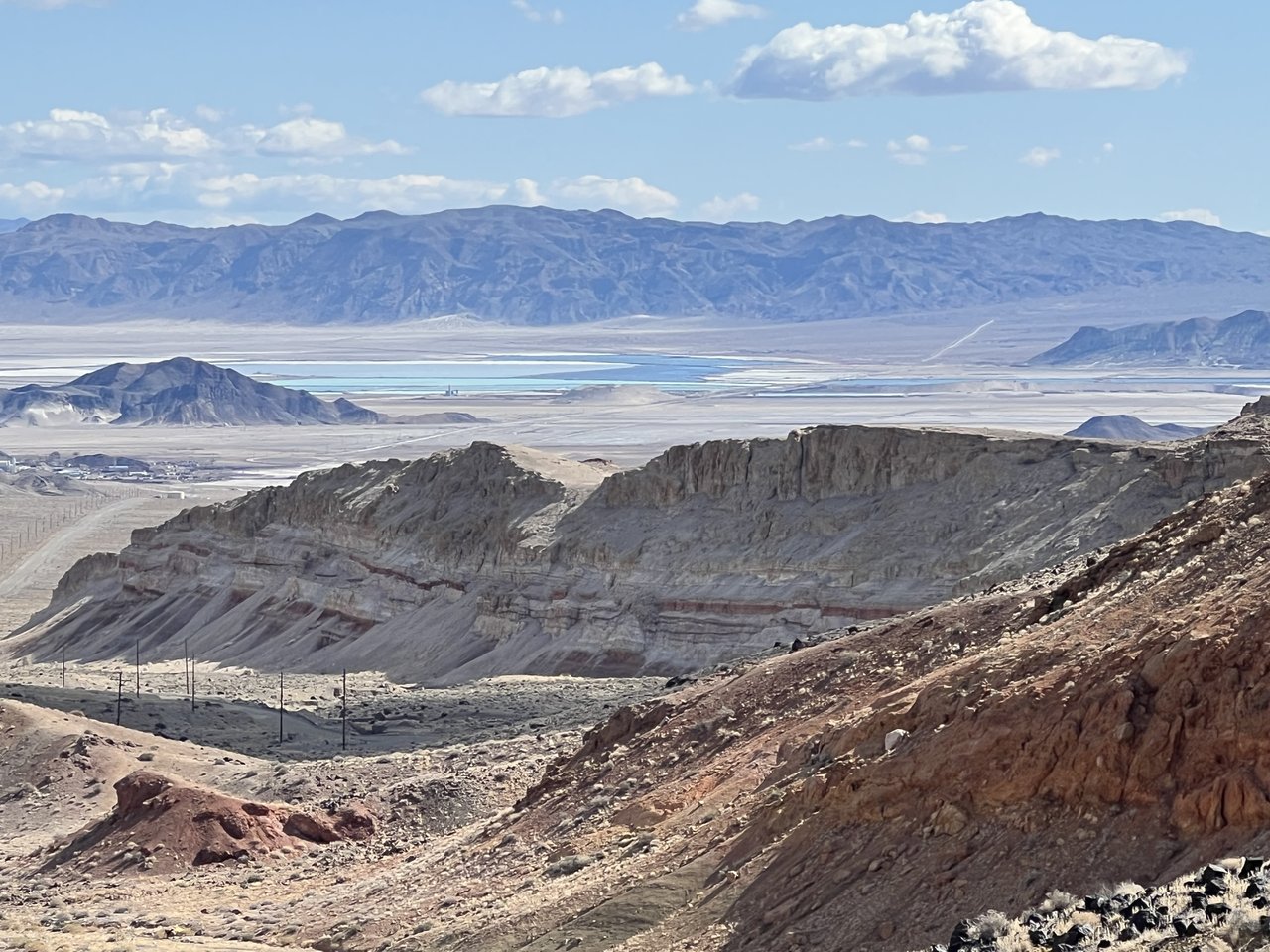 Valley with water and mountains in the background.