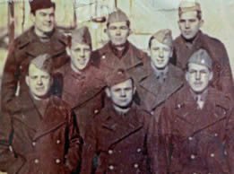 Waful (middle row, left) as a P.O.W. in Poland. During his internment, he often passed the time singing, as well as playing trombone and piano. On Christmas Day of 1944, Waful took part in six concerts for more than 1,800 other P.O.W.s.