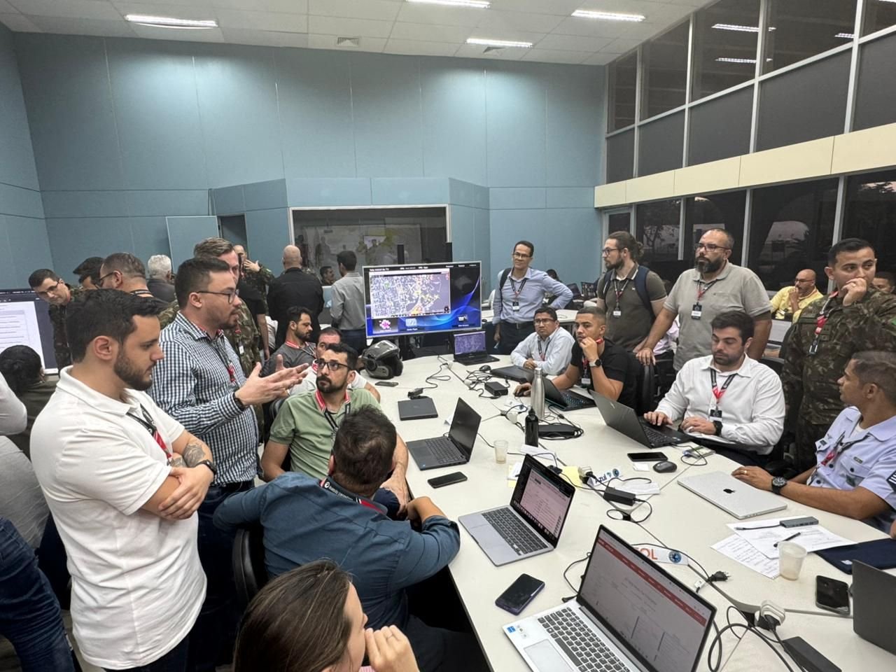 Room full of people working on computers.